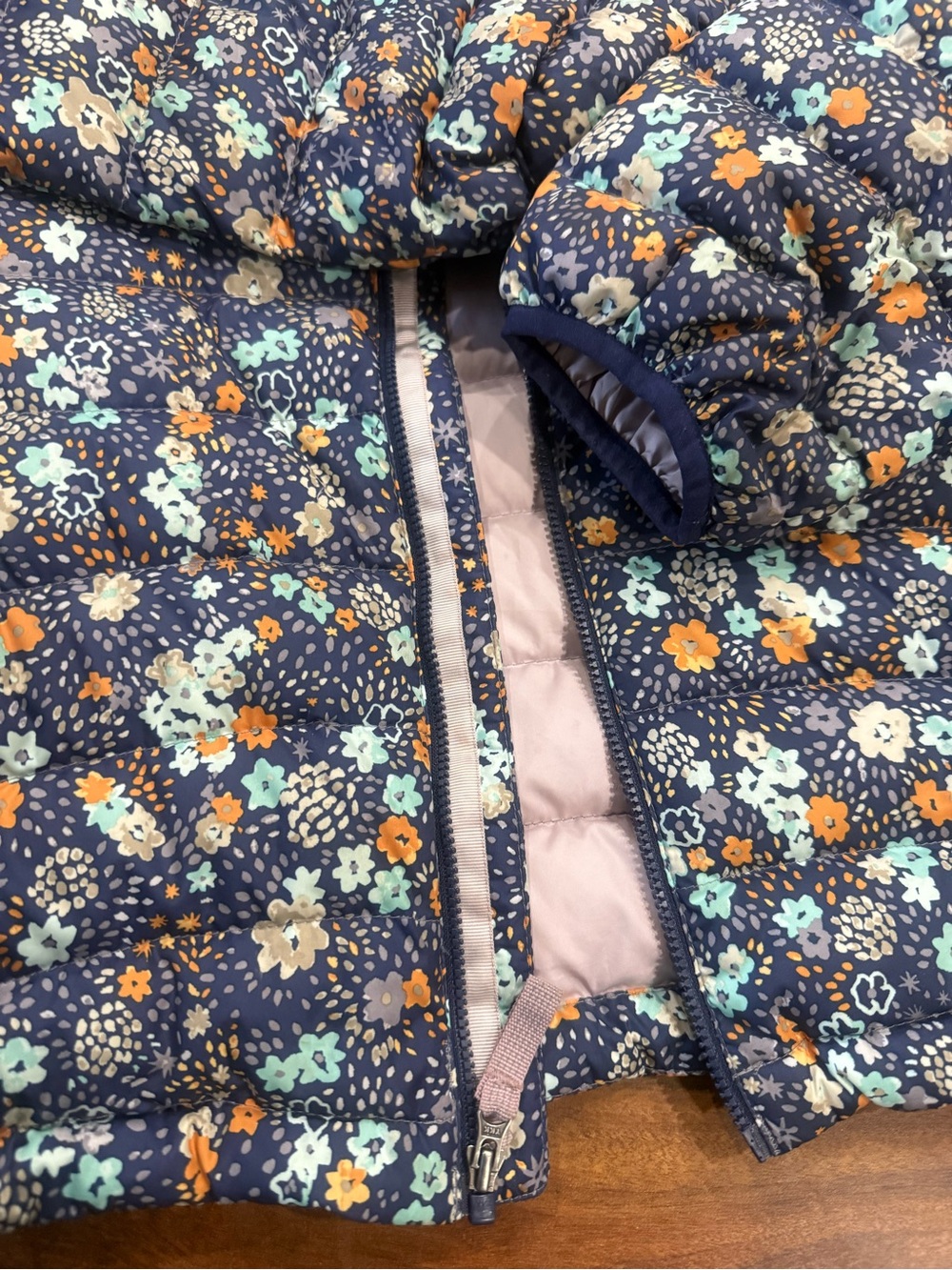 Patagonia Navy Floral Puffer Jacket with Orange & Mint Accents